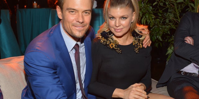 HOLLYWOOD, CA - FEBRUARY 05: Actor Josh Duhamel (L) and actress/singer Fergie attend the premiere of Relativity Media's "Safe Haven" after party at The Terrace At Hollywood & Highland on February 5, 2013 in Hollywood, California. (Photo by Alberto E. Rodriguez/Getty Images for Relativity Media)