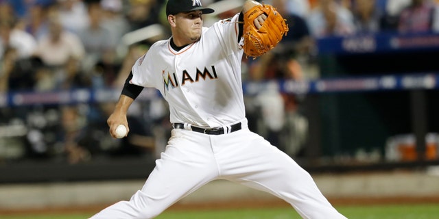 FILE - In this July 16, 2013 file photo, National Leagueâs Jose Fernandez, of the Miami Marlins, pitches during the sixth inning of the All-Star baseball game, in New York. Jose Fernandez of the Miami Marlins and Wil Myers of the Tampa Bay Rays have been selected baseball's Rookies of the Year. Fernandez stood out in a deep National League class, and the pitcher received 26 of 30 first-place votes from a Baseball Writers' Association of America panel in results revealed Monday, Nov. 11, 2013.(AP Photo/Kathy Willens, File)