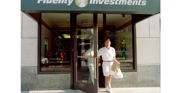 Customers leave a sales office of Fidelity Investments in Boston, August 27. Fidelity announced that it will take no new investors in its well-known Magellan Mutual Fund starting October 1. Fidelity is the largest mutual fund company in the world and is headquartered in Boston.