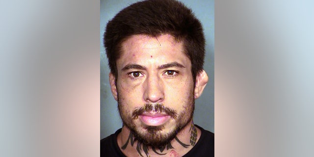This Aug. 30, 2014 booking photo provided by the Las Vegas Metropolitan Police Department shows Jonathan Koppenhaver, also known as MMA fighter War Machine.