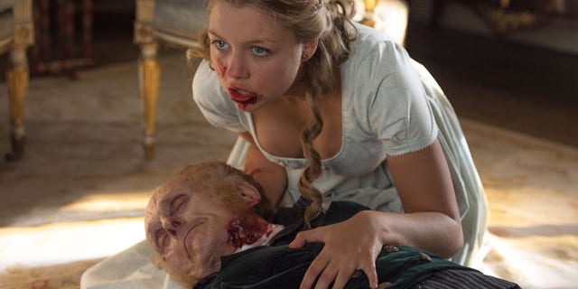 This image released by Screen Gems shows Jess Radomska in a scene from "Pride and Prejudice and Zombies." (Jay Maidment/Screen Gems, Sony via AP)