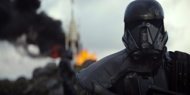 This image released by Disney shows a scene from the upcoming film, "Rogue One: A Star Wars Story." The world got a glimpse of Rogue One: A Star Wars Story in teaser trailer that debuted Thursday, April 7, 2016 on Good Morning America that introduces the rag tag rebels who unite to steal the plans for the Death Star, including The Theory of Everythings Felicity Jones. The film directed by Gareth Edwards also stars Diego Luna, Forest Whitaker and Ben Mendelsohn.