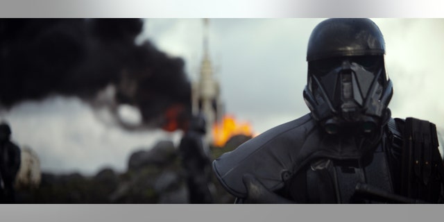 This image released by Disney shows a scene from the upcoming film, "Rogue One: A Star Wars Story." The world got a glimpse of Rogue One: A Star Wars Story in teaser trailer that debuted Thursday, April 7, 2016 on Good Morning America that introduces the rag tag rebels who unite to steal the plans for the Death Star, including The Theory of Everythings Felicity Jones. The film directed by Gareth Edwards also stars Diego Luna, Forest Whitaker and Ben Mendelsohn.
