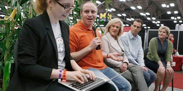 Victoria Taylor, far left, moderates a live, in-person "Ask Me Anything" session on GMOs, Monday, March 16, 2015 in Austin, TX.