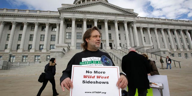 Jan. 27, 2015: Randy Gardner of Salt Lake City, the older brother of Ronnie Lee Gardner, the last inmate to be killed by firing squad in Utah in 2010, protests with a group opposed to capital punishment plans.