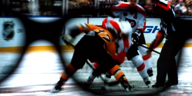 The view through the 3D lens as the "Winter Classic" -- a hockey match from earlier in the year -- is rebroadcast during intermission at Madison Square Garden Wednesday, March 24, 2010.