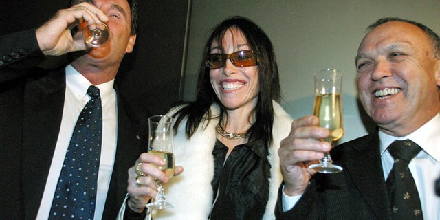 FILE 2003: Hollywood Madam Heidi Fleiss poses at the Australian Stock Exchange in Melbourne.