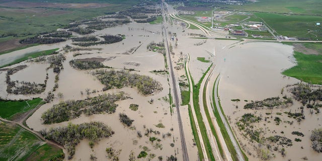 May 22: Flood water from the Little Bighorn River covers Interstate 90 near Crow Agency, Mont., in this aerial view on Sunday, May 22, 2011. (AP/The Billings Gazette)
