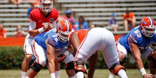 Apr 12, 2014; Gainesville, FL, USA; Florida Gators quarterback Will Grier (7) yells a snap count during the first half of the spring game at Ben Hill Griffin Stadium. Mandatory Credit: Rob Foldy-USA TODAY Sports