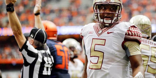 Syracuse head coach Scott Shafer yells to officials during the first half of an NCAA college football game against Florida State on Saturday, Oct. 11, 2014, in Syracuse, N.Y. Florida State won 38-20. (AP Photo/Mike Groll)