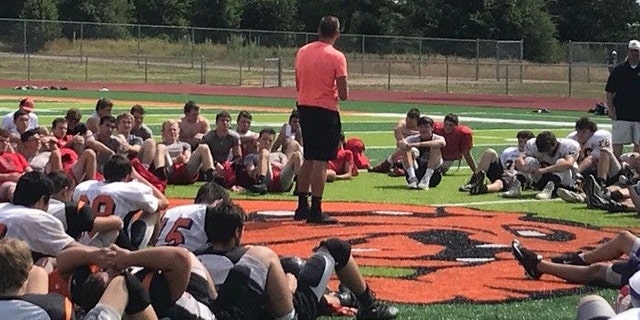 Konnor McKay leads a devotional at a regional summer camp in Arkansas.