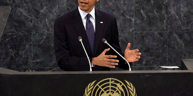 FILE - In this Sept. 24, 2013 file photo, President Barack Obama addresses the 68th session of the United Nations General Assembly. The United Nations Security Council is expected to adopt a binding resolution this week that would require nations to bar their citizens from traveling abroad to join terrorism organizations, part of a U.S.-led effort to galvanize the international community against what Obama administration officials call an "unprecedented" threat from extremists flocking to Syria and Iraq. (AP Photo/Richard Drew, File)