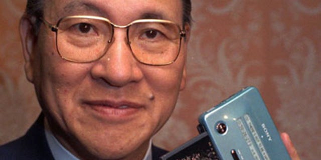 In this May 1991 file photo, former president and chairman of Sony, Norio Ohga, holds a Sony Mini Disc in New York. Sony says Ohga, credited with developing the compact disc, has died Saturday, April 23, 2011. He was 81. Sony Corp. Chairman Howard Stringer said Ohga helped redefine the Japanese manufacturer not only as an electronic hardware company but helped it also expand into software or entertainment. (AP/File)