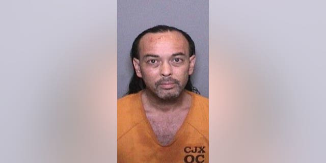 Officials at the Cleveland National Forest say 51-year-old Forrest Gordon Clark was booked Wednesday on suspicion of two counts of felony arson, and one count each of felony threat to terrorize and misdemeanor resisting arrest. (Orange County Sheriff’s Department)
