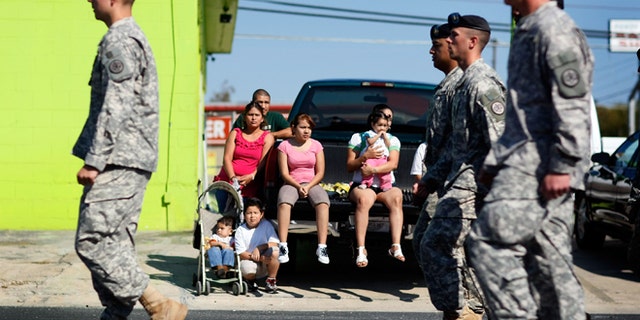 U.S. Army soldiers from Fort Hood march in a Veterans Day parade through downtown in Killeen, Texas.