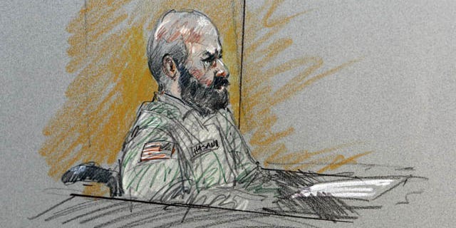 FILE- In this Aug. 6, 2013, file courtroom sketch, Maj. Nidal Malik Hasan sits in court for his court-martial in Fort Hood, Texas. (AP Photo)