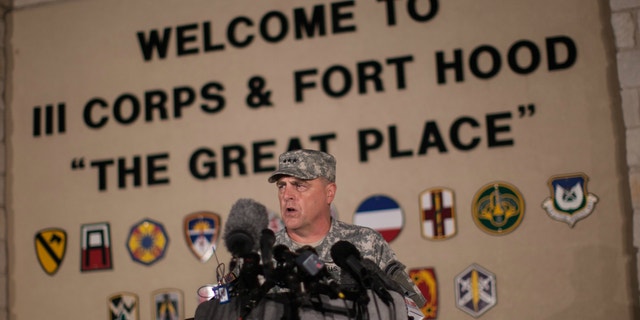 Lt. Gen. Mark Milley, commanding general of III Corps and Fort Hood, speaks with the media outside of an entrance to the Fort Hood military base following a shooting that occurred inside, Wednesday, April 2, 2014, in Fort Hood, Texas.