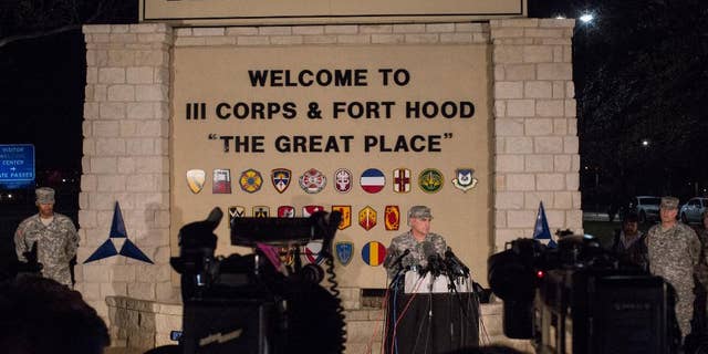 Lt. Gen. Mark Milley, commanding general of III Corps and Fort Hood, speaks with the press outside of an entrance to the Fort Hood military base following a shooting that occurred inside on April 2, 2014 in Fort Hood, TX. A soldier assigned to the military installation was found dead near a barracks over the weekend. . (AP Photo/ Tamir Kalifa)