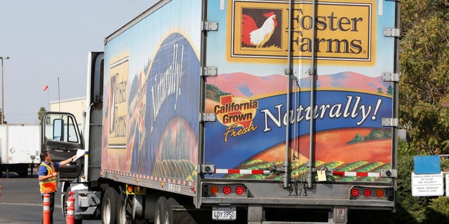 A truck enters the Foster Farms processing plant on Thursday, Oct. 10, 2013, in Livingston, Calif. (AP Photo/Rich Pedroncelli)