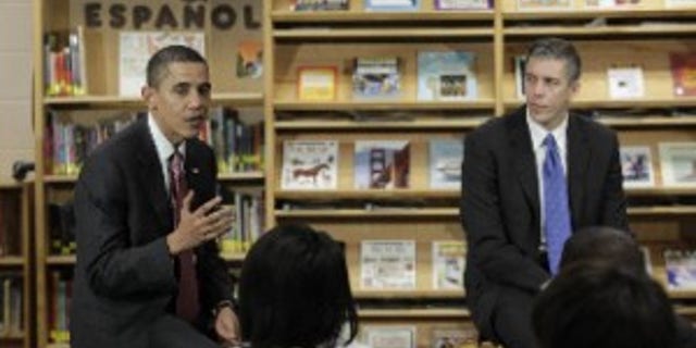 President Obama and Education Secretary Arne Duncan speak to students at Wright Middle School in Madison, WI (AP Photo)