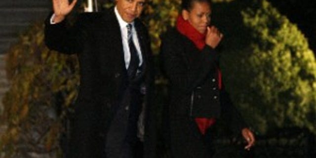 President Barack Obama and first lady Michelle Obama depart the White House in Washington, Wednesday, Dec. 9, 2009, en route to Oslo, Norway, where he will accept the Nobel Peace Prize. (AP Photo/Charles Dharapak)
