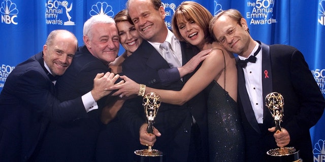Mahoney, pictured second from the left, poses alongside the "Frasier" cast at the 50th Annual Emmy Awards in Los Angeles on Sept. 13, 1998. The series broke an Emmy record by winning for the fifth time.