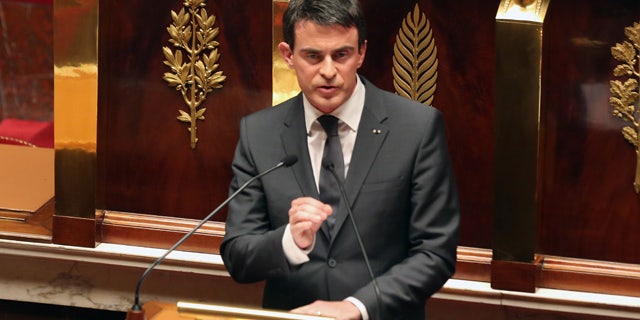 Jan. 13, 2015: French prime minister Manuel Valls delivers his speech during a homage to the 17 victims of last week's terrorist attacks in Paris. (AP Photo/Remy de la Mauviniere)