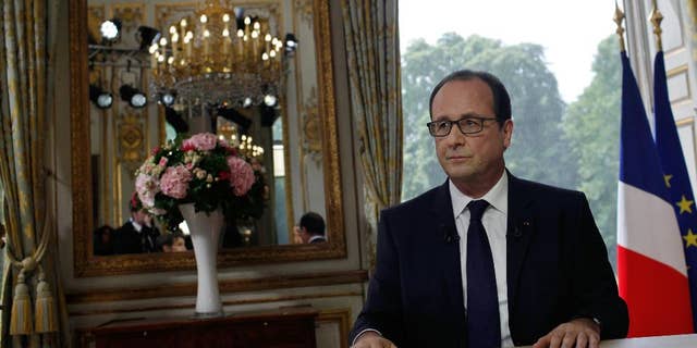 France's President Francois Hollande after the traditional interview following the bastille day parade, at the Elysee Palace, in Paris, Monday, July 14, 2014. Hollande is urging partners to talk to Hamas and is pressing Israel for calm in hopes of reaching a cease-fire in Gaza. (AP Photo/Thibault Camus, Pool)
