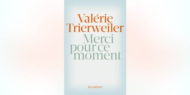 This photo provided Wednesday Sept. 3, 2014 by the publisher Les Arenes shows the front page of Valerie Trierweiler's book "Merci pour ce moment" (Thanks for this moment). Former French first lady Valerie Trierweiler's book relates her life at the presidential palace under French President Francois Hollande and will go on sale Thursday.(AP Photo/Editions Les Arenes)