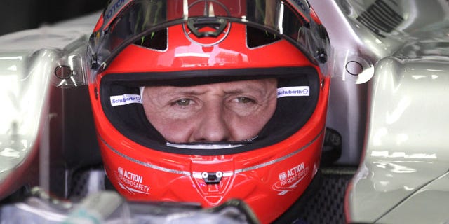 FILE - In this Nov. 23, 2012 file photo, Grand Prix driver Michael Schumacher, of Germany, sits in his car during a free practice at the Interlagos race track in Sao Paulo, Brazil. (AP)