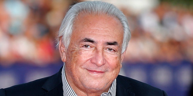 FILE - This Saturday, Sept. 13, 2014, file photo shows former IMF Secretary General Dominique Strauss-Kahn arriving for the award ceremony at the 40th American Film Festival in Deauville, Normandy, western France. (AP Photo/Jacques Brinon, File)