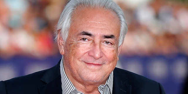 FILE - This Saturday, Sept. 13, 2014, file photo shows former IMF Secretary General Dominique Strauss-Kahn arriving for the award ceremony at the 40th American Film Festival in Deauville, Normandy, western France. (AP Photo/Jacques Brinon, File)