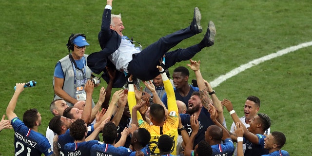 The French National Team celebrates after the FIFA World Cup against Croatia.