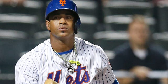FILE - In this Sept. 20, 2016, file photo, New York Mets' Yoenis Cespedes reacts after striking out swinging for the final out in the Mets' 5-4 loss to the Atlanta Braves in a baseball game in New York. Cespdes is expected to opt out of the remainder of his contract, which would pay $47.5 million over two seasons, and become a free agent again. (AP Photo/Kathy Willens, File)