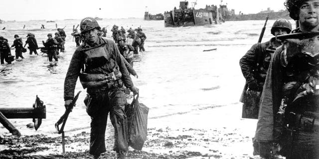 FILE: U.S. Army soldiers land on Omaha Beach during D-Day invasion, Normandy, France