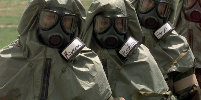 Army lieutenants listen during chemical training at the Chemical Decontamination Training Facility at Fort McClellan near Anniston, Ala. on Tuesday, May 20, 1997. The CDTF is the only U.S. military facility where live chemical training occurs. (AP Photo/Dave Martin)