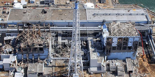 An aerial view of the Fukushima Daiichi Nuclear Power Station is seen in Fukushima Prefecture in this photo taken by the Air Photo Service on March 24, 2011. Japanese Prime Minister Naoto Kan said on April 1, 2011 he was ready for a long fight to bring a quake-hit nuclear plant under control but was convinced Japan would overcome the world's worst nuclear crisis since the Chernobyl disaster in 1986. Picture taken on March 24, 2011. Mandatory Credit REUTERS/Air Photo Service (JAPAN - Tags: DISASTER ENERGY BUSINESS) NO COMMERCIAL USE. FOR EDITORIAL USE ONLY. NOT FOR SALE FOR MARKETING OR ADVERTISING CAMPAIGNS. MANDATORY CREDIT - GM1E7411IBB01