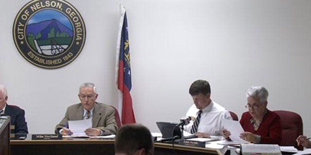 April 1, 2013: The Nelson, Ga. City Council meets to vote on a mandatory gun ownership ordinance for all heads-of-household.