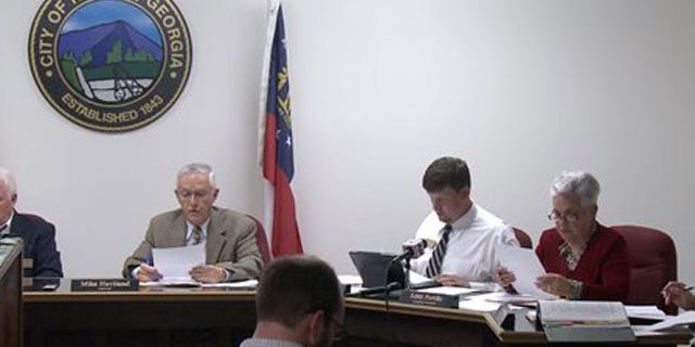 April 1, 2013: The Nelson, Ga. City Council meets to vote on a mandatory gun ownership ordinance for all heads-of-household.