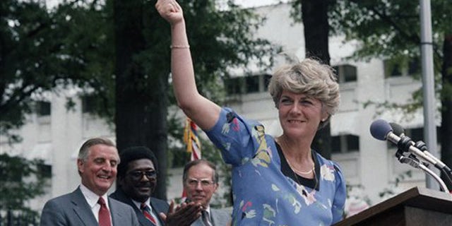 FILE - In this Wednesday, Aug. 1, 1984 file picture, Democratic vice presidential candidate Geraldine Ferraro gives the thumbs-up sign to a crowd of supporters in downtown Jackson, Miss. as Walter Mondale and Ferraro kicked off their 1984 campaign in this Southern city. Behind Ferraro are Mondale, state Rep. Robert Clark and former Gov. William Winter.