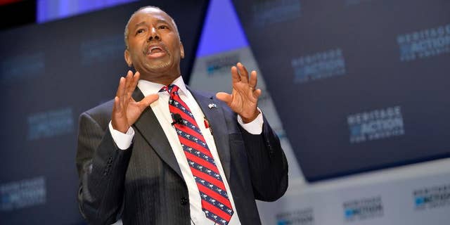 FILE - In this Sept. 18, 215 file photo, Republican presidential candidate Ben Carson speaks in Greenville, S.C. Carson is refusing to back off his weekend charge that Muslims shouldn’t serve in the presidency. (AP Photo/Richard Shiro, File)