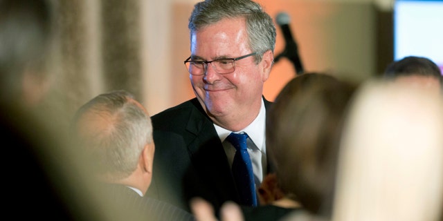 Dec. 2, 2014: Former Florida Gov. Jeb Bush talks to supporters after speaking at the U.S. Cuba Democracy PAC's 11th Annual Luncheon in Coral Gables, Fla. (AP Photo/J Pat Carter)