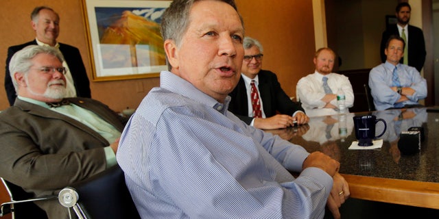 June 5, 2015: Ohio Gov. John Kasich speaks during a luncheon meeting with area business leaders in Concord, N.H. (AP Photo/Jim Cole)