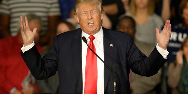 Nov. 9, 2015: Republican presidential candidate Donald Trump speaks to a crowd of supporters during a campaign rally in Springfield, Ill. (AP Photo/Seth Perlman)