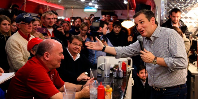 FILE - In this Jan 4, 2016 file photo, Republican Presidential candidate, Sen. Ted Cruz, R-Texas, campaigns at Penny's Diner in Missouri Valley, Iowa. Cruz and Marco Rubio are fighting for the favor of many of the same undecided voters across Iowa, where even some of the most attentive Republicans say they canât make up their minds less than four weeks before voting begins. (AP Photo/Nati Harnik, File)