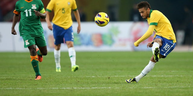 Neymar of Brazil, right, in action during a match between Brazil and Zambia at Beijing National Stadium Oct. 15, 2013, in Beijing, China.
