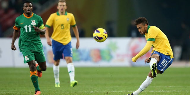 Neymar of Brazil, right, in action during a match between Brazil and Zambia at Beijing National Stadium Oct. 15, 2013, in Beijing, China.