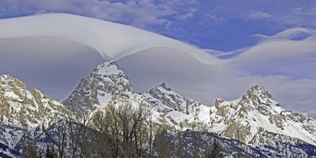 Jackie Skaggs snapped this stunning photo of a lenticular cloud embracing the summit of the Grand Teton Range from the park's headquarters in Moose, Wyoming, on Feb. 12, 2015.