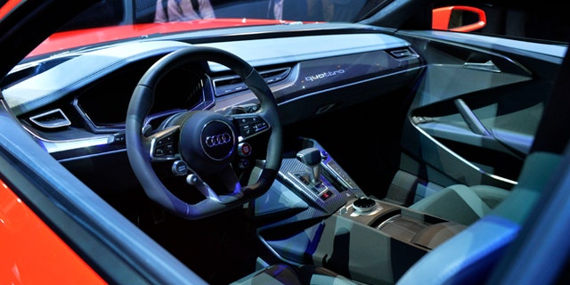 Audi unveils their new Sport Quattro laserlight Concept car during the Audi keynote at the International Consumer Electronics Show, Monday, Jan. 6, 2014, in Las Vegas.