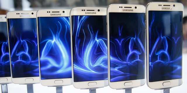 A row of Galaxy S6 edge smartphones are seen on display after the Samsung Galaxy Unpacked event before the Mobile World Congress in Barcelona March 1, 2015.